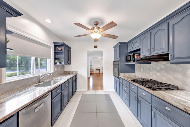 5238 Peg Ln, Memphis, TN 38117 - kitchen with black appliances, open shelves, under cabinet range hood, ceiling fan, and decorative backsplash