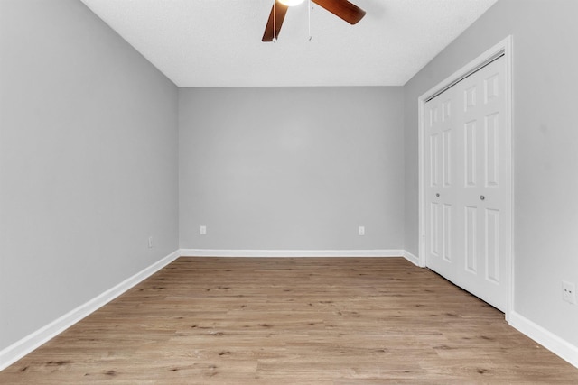 5315 Sleepy Oak Cv, Memphis, TN 38141 - unfurnished bedroom with light wood finished floors, a closet, and baseboards