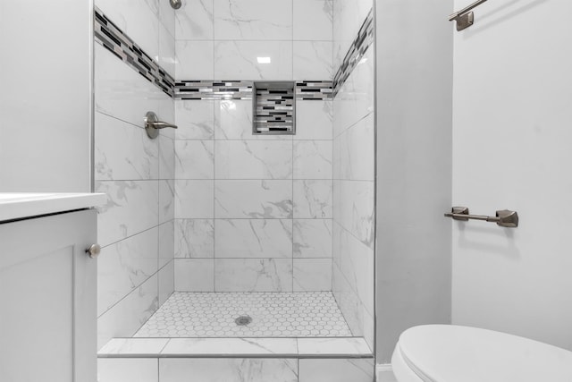 5315 Sleepy Oak Cv, Memphis, TN 38141 - bathroom featuring a tile shower and toilet