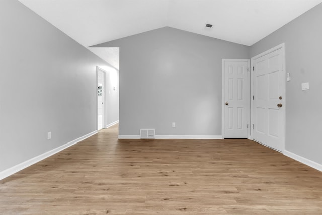 5315 Sleepy Oak Cv, Memphis, TN 38141 - spare room featuring lofted ceiling, light wood finished floors, and baseboards