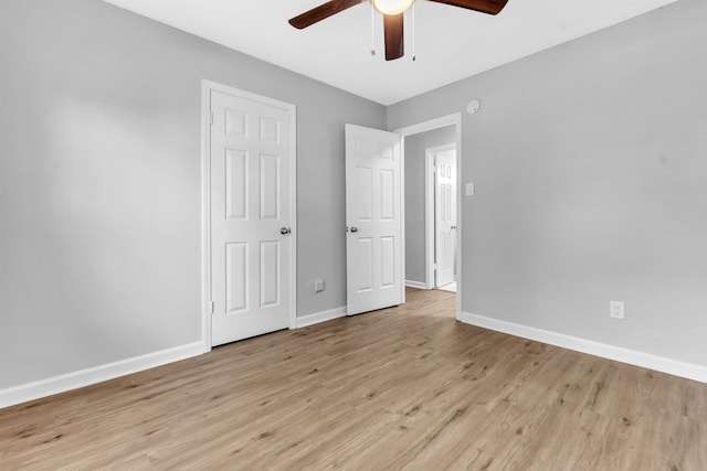 5315 Sleepy Oak Cv, Memphis, TN 38141 - unfurnished bedroom featuring light wood finished floors, baseboards, and a ceiling fan