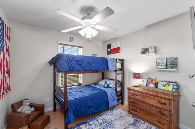 1730 Catfish Ln, Crump, TN 38327 - bedroom with tile patterned floors, baseboards, and a ceiling fan
