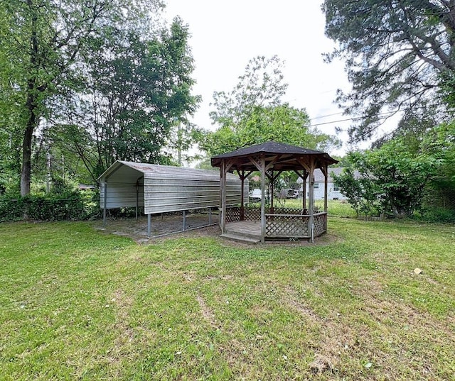 4485 Dunn Rd, Memphis, TN 38117 - view of green lawn with a gazebo and a detached carport