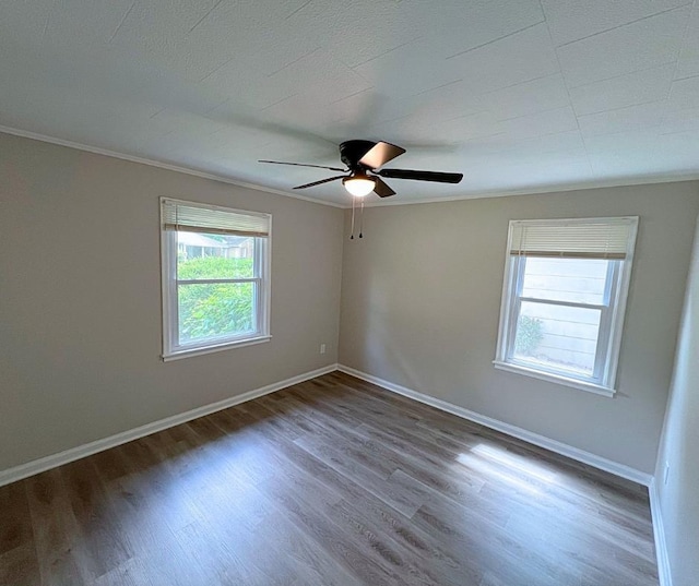 4485 Dunn Rd, Memphis, TN 38117 - empty room featuring ornamental molding, wood finished floors, ceiling fan, and baseboards