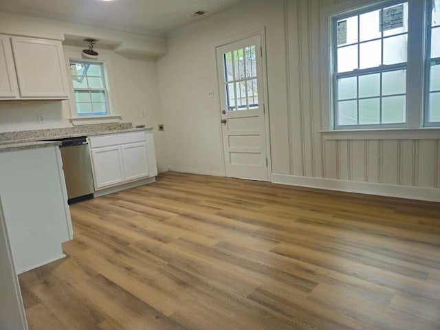 4078 Burrow Ave, Memphis, TN 38128 - kitchen with white cabinets, light wood-style flooring, dishwasher, and ornamental molding