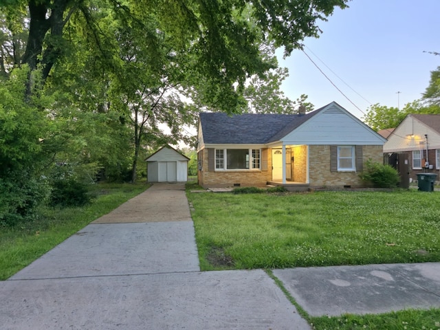 4078 Burrow Ave, Memphis, TN 38128 - view of front of property with driveway, a garage, crawl space, a front yard, and brick siding