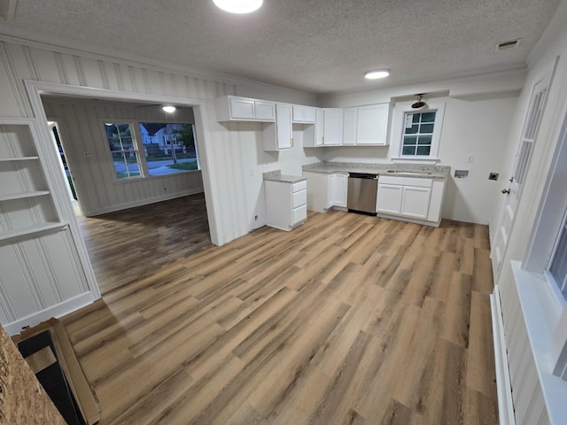 4078 Burrow Ave, Memphis, TN 38128 - kitchen featuring dishwasher, light wood-style flooring, white cabinetry, and a textured ceiling