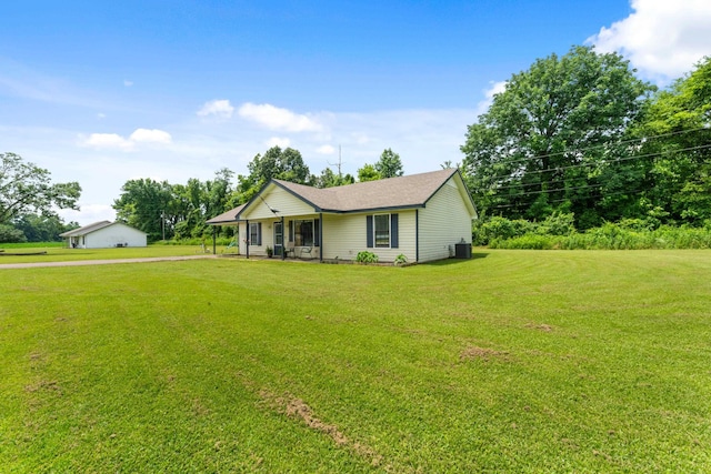 59 Crosswinds Cv, Henning, TN 38041 - single story home featuring a front lawn, cooling unit, and driveway