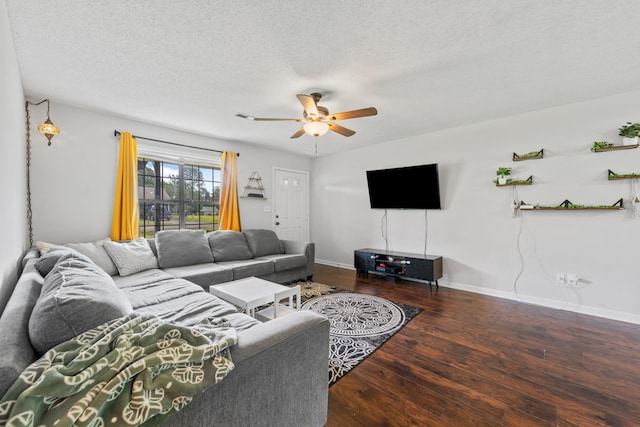 59 Crosswinds Cv, Henning, TN 38041 - living room featuring ceiling fan, wood finished floors, baseboards, and a textured ceiling