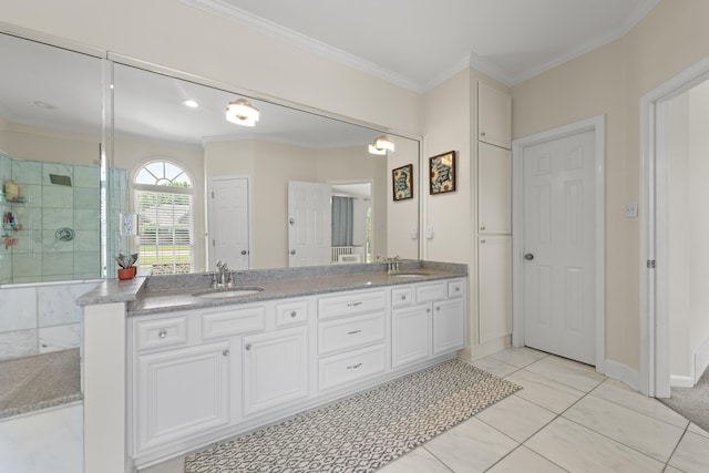 895 Joe Dr, Collierville, TN 38017 - full bath featuring tiled shower, double vanity, tile patterned flooring, ornamental molding, and baseboards