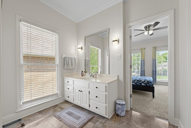 895 Joe Dr, Collierville, TN 38017 - bathroom with crown molding, vanity, ceiling fan, connected bathroom, and tile patterned flooring
