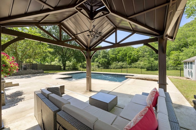 895 Joe Dr, Collierville, TN 38017 - fenced backyard featuring an outdoor hangout area, a gazebo, a patio area, and view of scattered trees