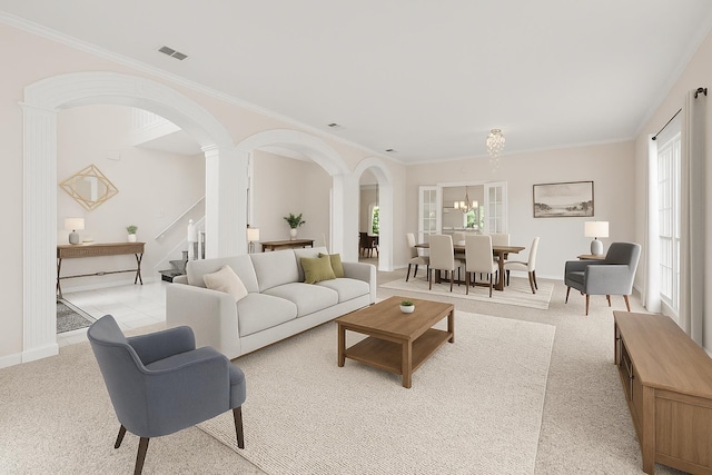895 Joe Dr, Collierville, TN 38017 - living area with arched walkways, plenty of natural light, stairs, a chandelier, and ornamental molding