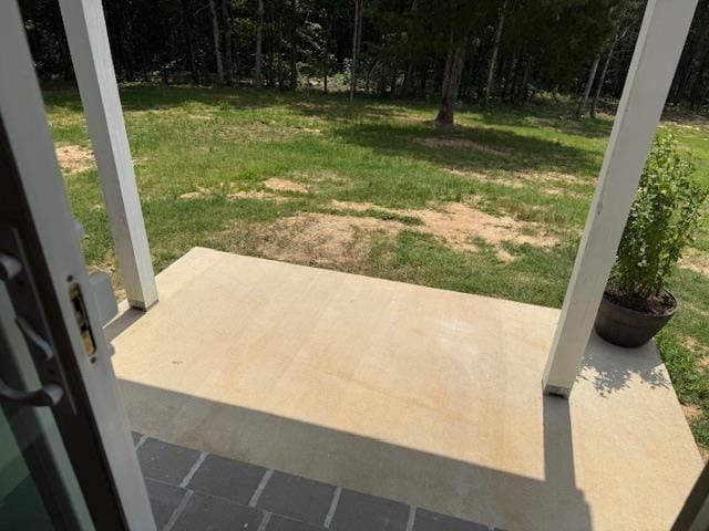 135 Lapa Ln, Clifton, TN 38425 - view of grassy yard featuring a patio
