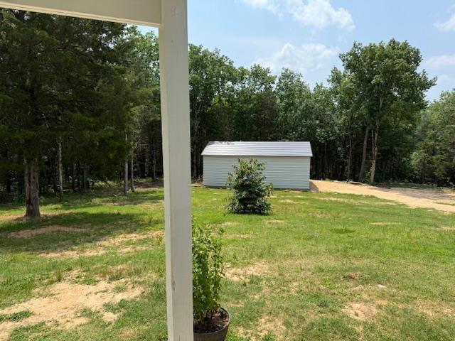 135 Lapa Ln, Clifton, TN 38425 - view of green lawn
