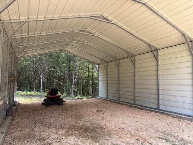 135 Lapa Ln, Clifton, TN 38425 - view of vehicle parking with a carport