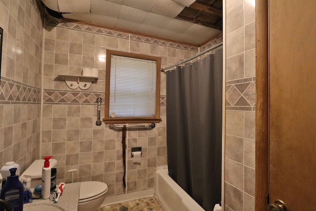 69 Crutcher Lake Rd, Henning, TN 38041 - bathroom with toilet, tile walls, and shower / tub combo