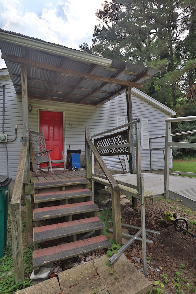 69 Crutcher Lake Rd, Henning, TN 38041 - entrance to property with a porch and a wooden deck