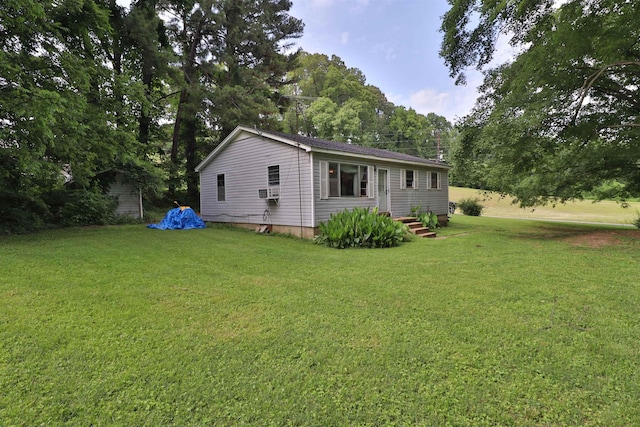 69 Crutcher Lake Rd, Henning, TN 38041 - view of property exterior featuring a yard