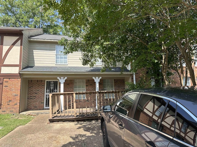 3047 Mcvay Trail Dr, Memphis, TN 38119 - view of front of house with a porch and brick siding