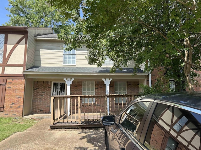 3047 Mcvay Trail Dr, Memphis, TN 38119 - view of front of home with brick siding and a porch
