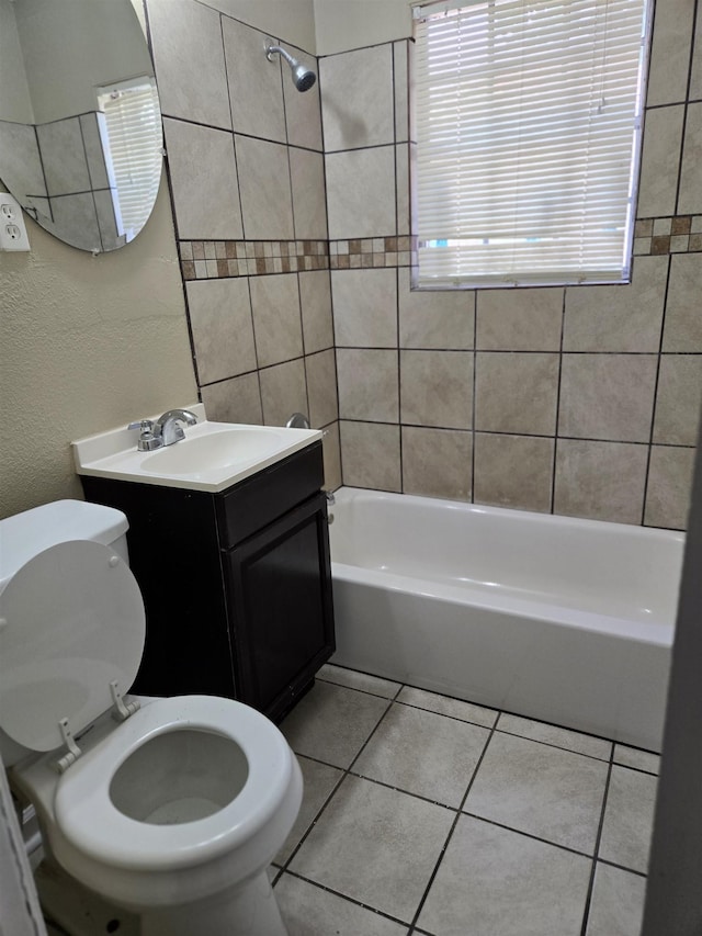 4207 Kenosha Rd, Memphis, TN 38118 - bathroom featuring toilet, shower / bath combination, tile patterned floors, vanity, and a textured wall