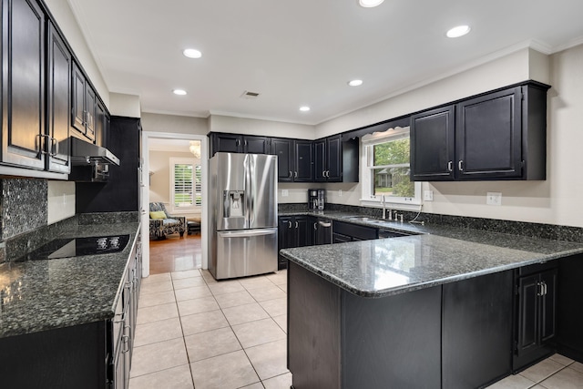 2019 Kostka Ln, Germantown, TN 38139 - kitchen with stainless steel fridge with ice dispenser, dark cabinets, a sink, a peninsula, and plenty of natural light