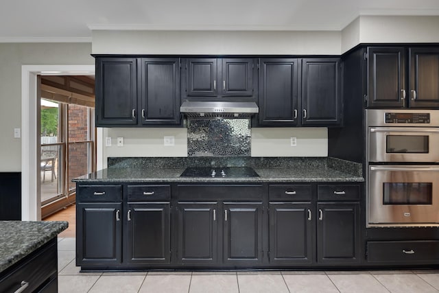 2019 Kostka Ln, Germantown, TN 38139 - kitchen featuring stainless steel double oven, dark cabinets, light tile patterned floors, ornamental molding, and black electric stovetop