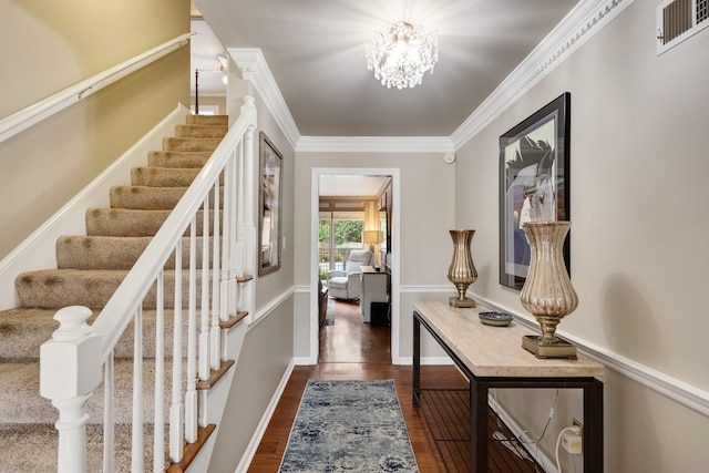 2019 Kostka Ln, Germantown, TN 38139 - foyer with stairs, dark wood-style flooring, a chandelier, and crown molding