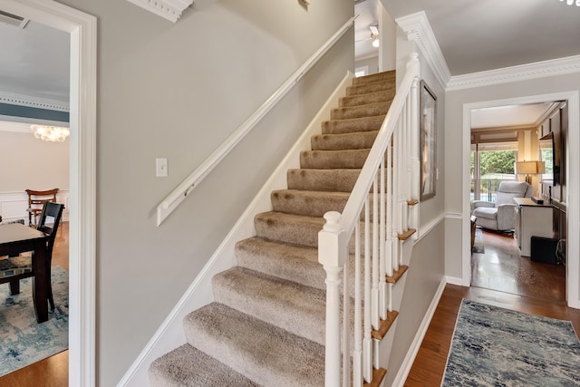 2019 Kostka Ln, Germantown, TN 38139 - staircase featuring wood finished floors and crown molding