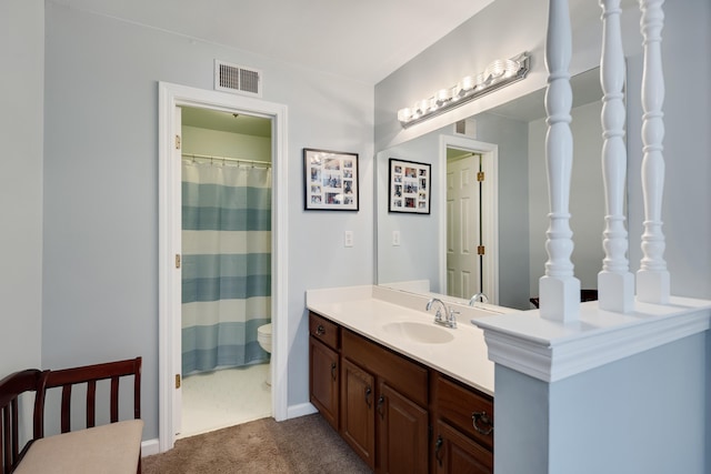2019 Kostka Ln, Germantown, TN 38139 - full bathroom with vanity, toilet, baseboards, and a shower with curtain