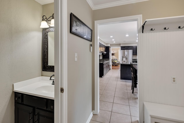 2019 Kostka Ln, Germantown, TN 38139 - bathroom with tile patterned floors, crown molding, vanity, recessed lighting, and baseboards