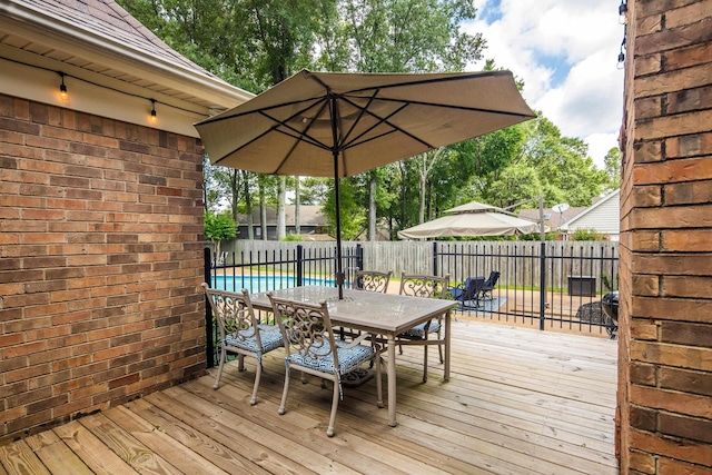2019 Kostka Ln, Germantown, TN 38139 - deck with outdoor dining space and a fenced backyard