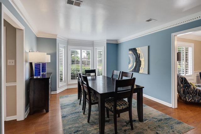 2019 Kostka Ln, Germantown, TN 38139 - dining room featuring wood finished floors, crown molding, and baseboards