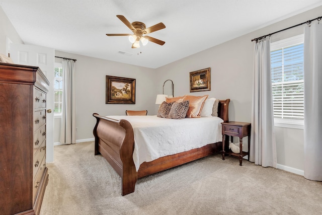 7255 Barnstable Dr, Memphis, TN 38125 - bedroom featuring light colored carpet, baseboards, and ceiling fan