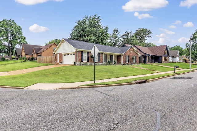 7255 Barnstable Dr, Memphis, TN 38125 - ranch-style home with brick siding, an attached garage, and driveway