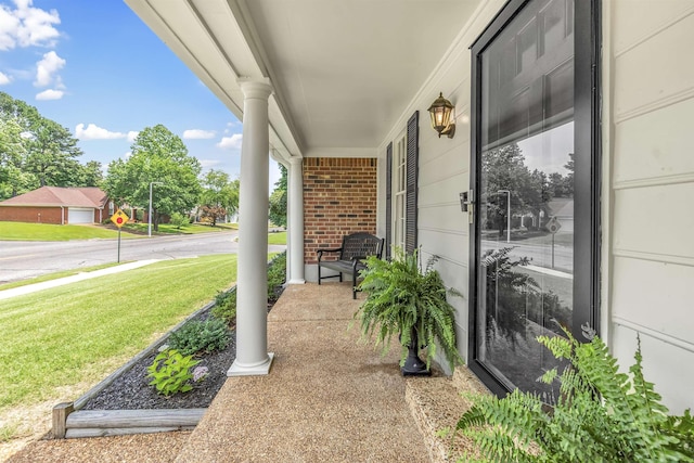 7255 Barnstable Dr, Memphis, TN 38125 - covered porch with a yard