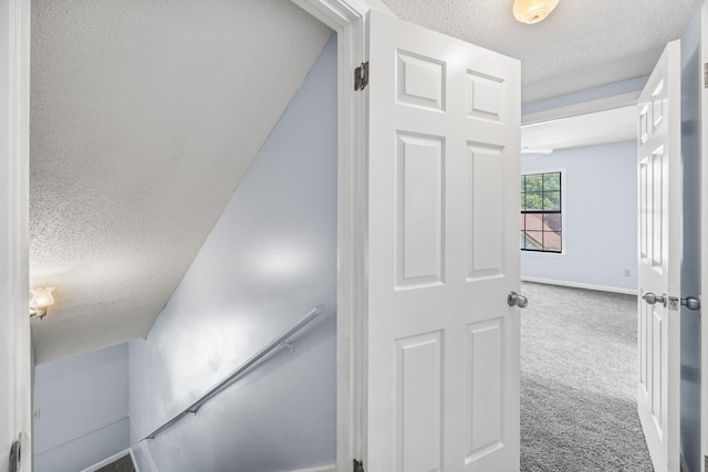 5424 Peyton Randolph St, Bartlett, TN 38134 - hall featuring a textured ceiling, carpet flooring, and baseboards