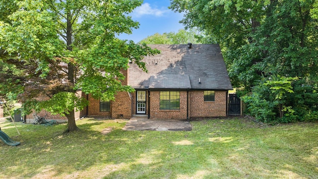 5424 Peyton Randolph St, Bartlett, TN 38134 - back of property with a patio and brick siding