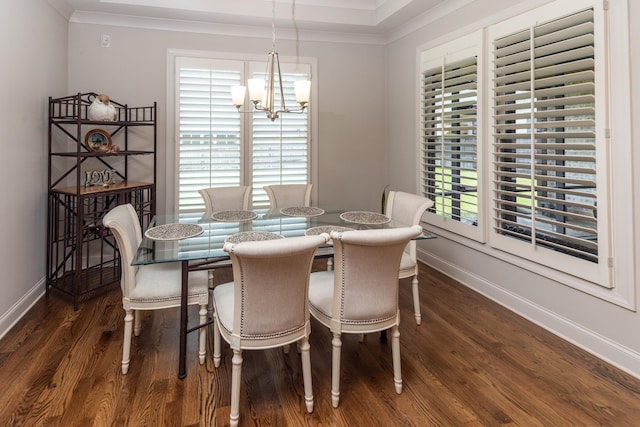 12432 Zapata Cv, Collierville, TN 38017 - dining space with a chandelier, crown molding, wood finished floors, and baseboards
