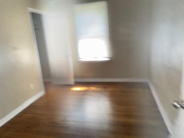 1245 Holliday Ave, Memphis, TN 38122 - unfurnished room featuring wood finished floors and baseboards