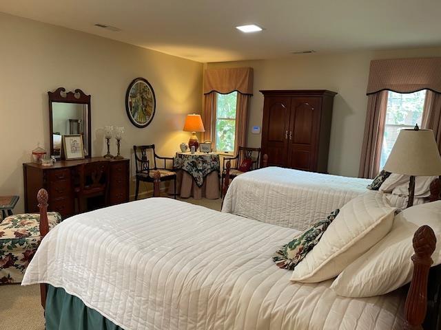 4659 Laurel Oaks Dr Unit 4659, Memphis, TN 38117 - carpeted bedroom with multiple windows