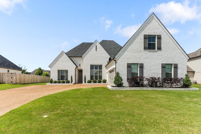 9709 Woodland Brook Ln S, Cordova, TN 38018 - french provincial home featuring brick siding, driveway, and a garage