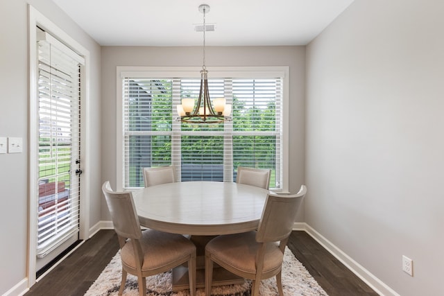9709 Woodland Brook Ln S, Cordova, TN 38018 - dining room featuring dark wood-style flooring and baseboards