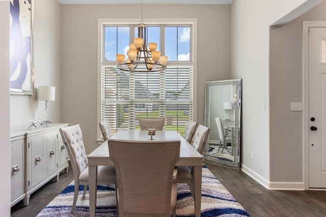 9709 Woodland Brook Ln S, Cordova, TN 38018 - dining area featuring a chandelier, dark wood-style flooring, and baseboards