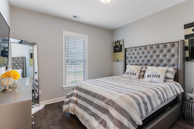 9709 Woodland Brook Ln S, Cordova, TN 38018 - bedroom with wood finished floors, multiple windows, and baseboards