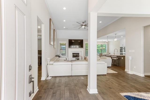 9709 Woodland Brook Ln S, Cordova, TN 38018 - living room with ceiling fan, dark wood-type flooring, a glass covered fireplace, recessed lighting, and baseboards
