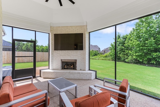 9709 Woodland Brook Ln S, Cordova, TN 38018 - sunroom featuring a ceiling fan and an outdoor living space with a fireplace