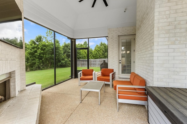 9709 Woodland Brook Ln S, Cordova, TN 38018 - sunroom with ceiling fan and an outdoor living space with a fireplace