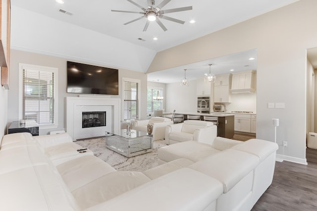 9709 Woodland Brook Ln S, Cordova, TN 38018 - living area featuring ceiling fan, dark wood finished floors, a fireplace, lofted ceiling, and recessed lighting